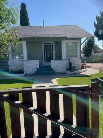 a view of swimming pool with seating space