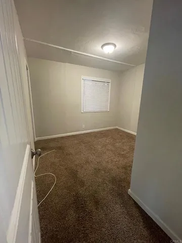 an empty room with a door