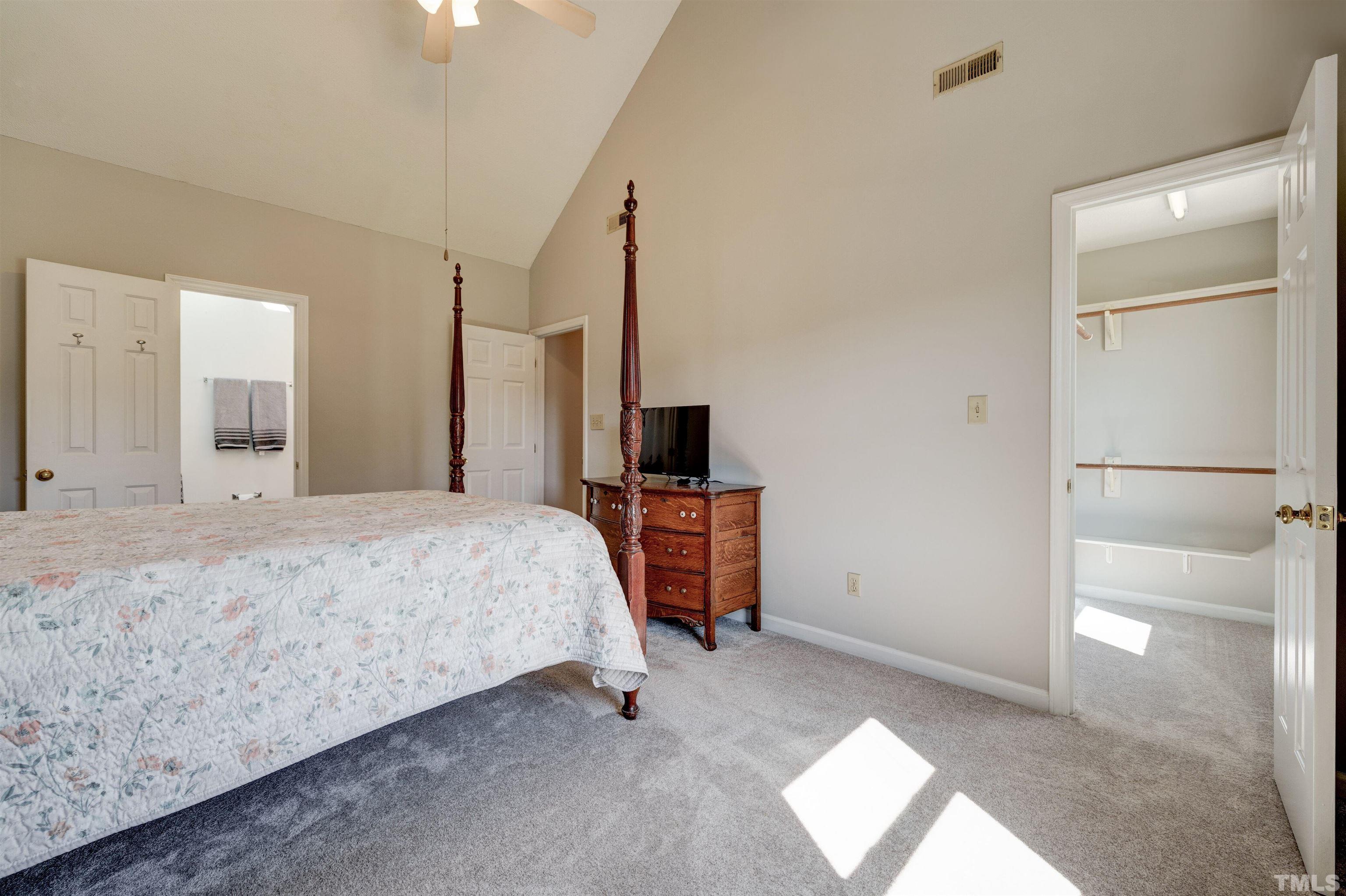 429 South Meadow Road Raleigh, NC 27603 - Photo 20 of 44 a bedroom with a bed and a television