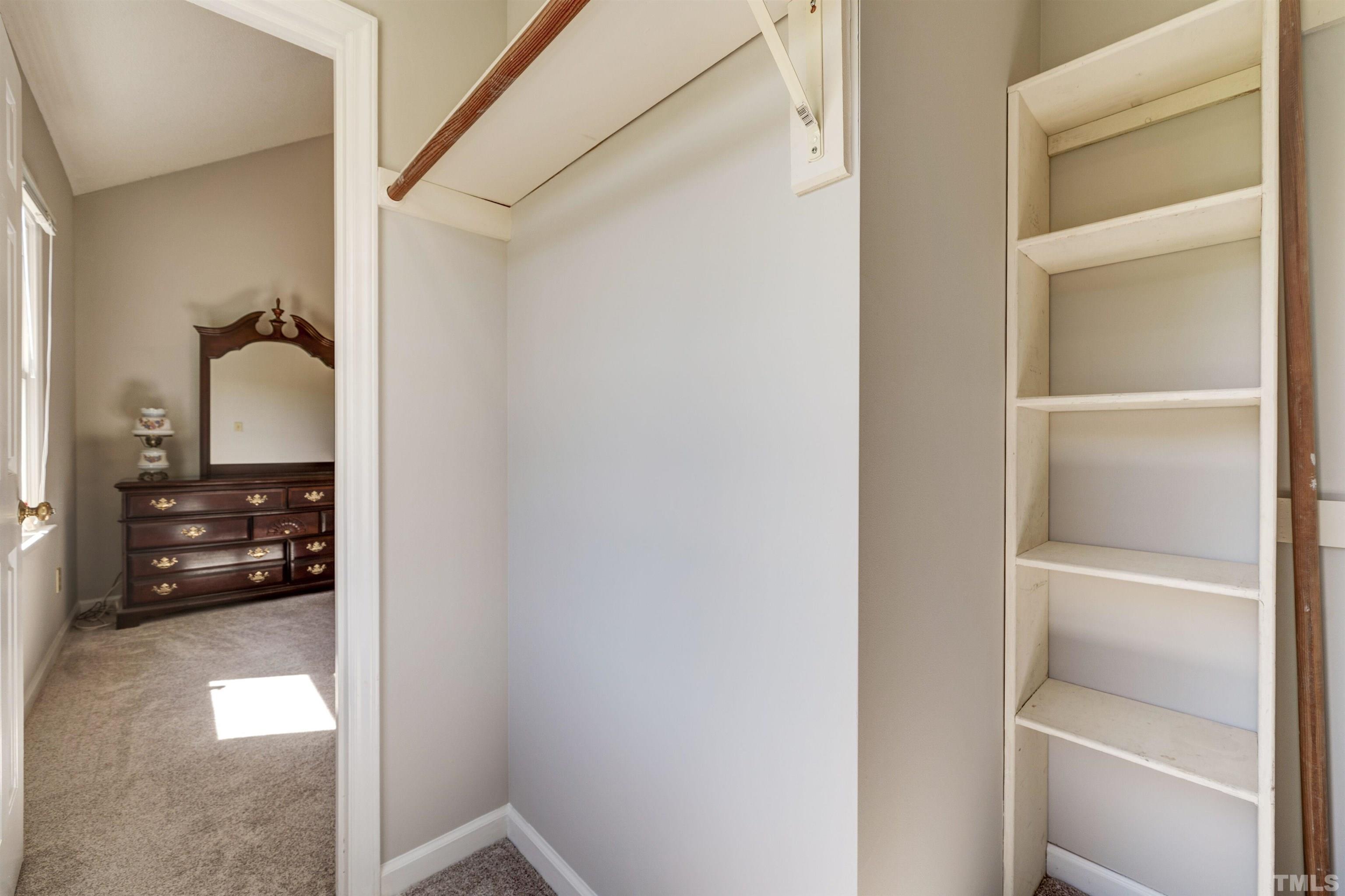 429 South Meadow Road Raleigh, NC 27603 - Photo 21 of 44 a view of a bedroom from a hallway