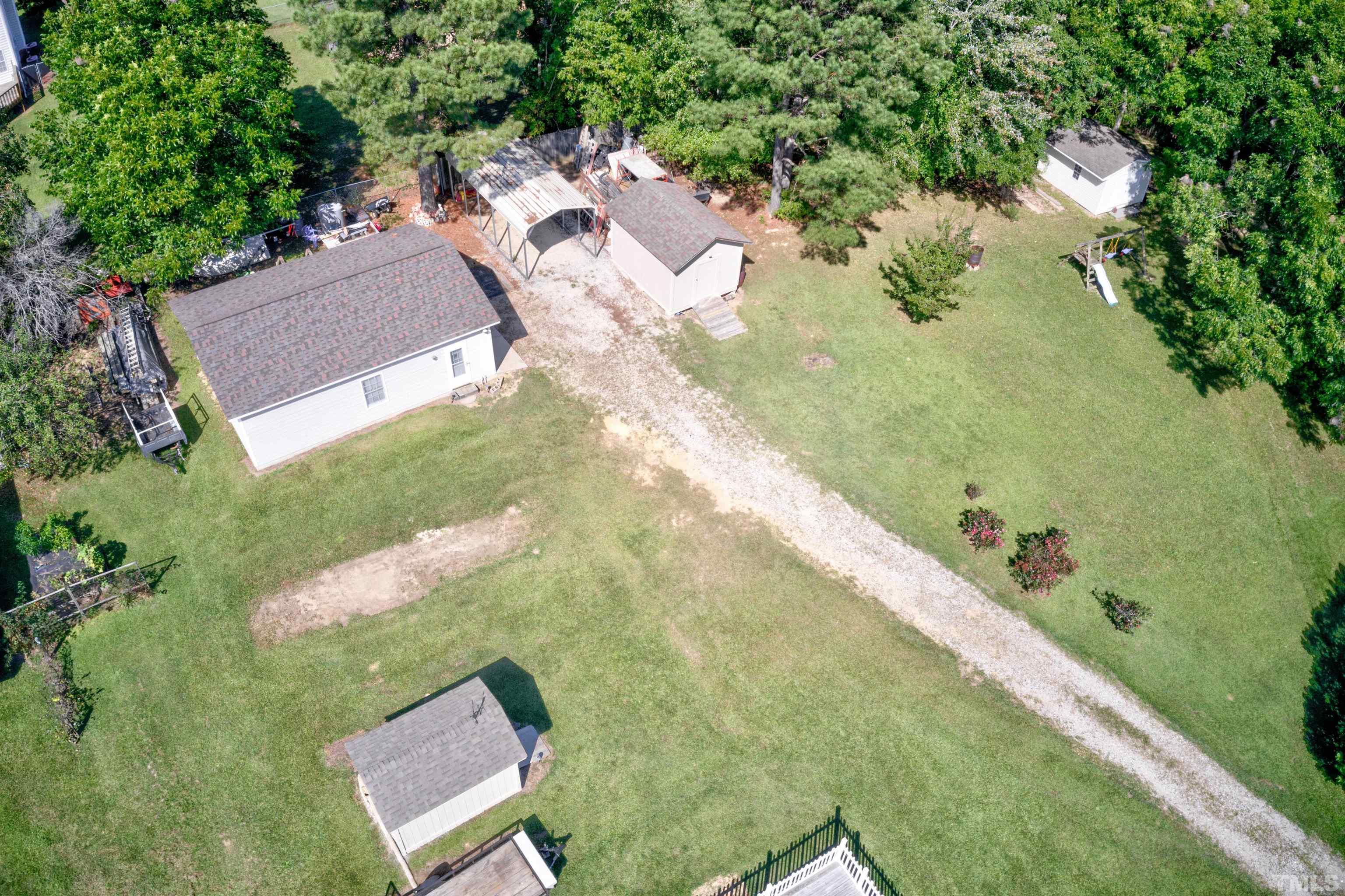 429 South Meadow Road Raleigh, NC 27603 - Photo 43 of 44 an aerial view of residential houses with outdoor space