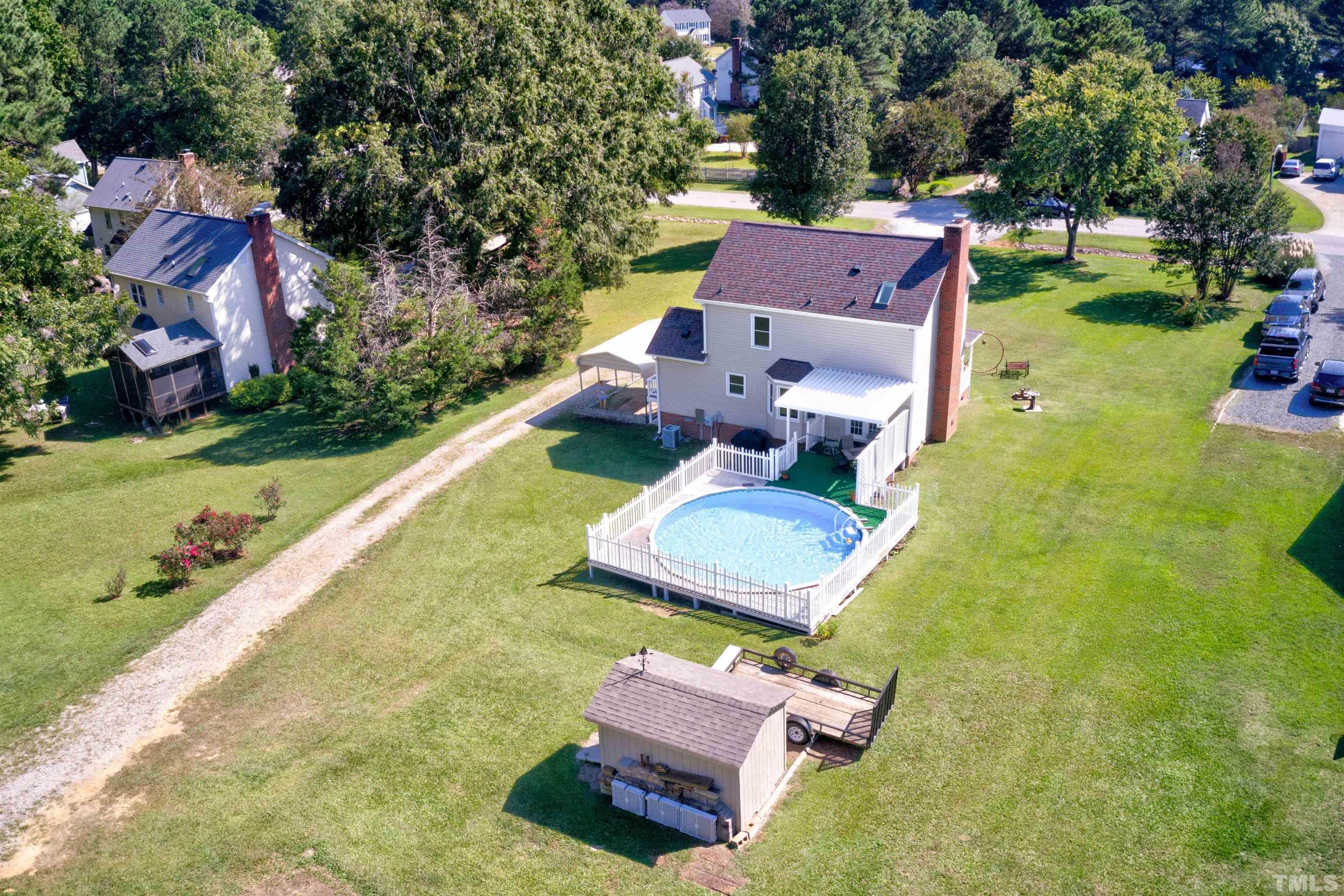 429 South Meadow Road Raleigh, NC 27603 - Photo 44 of 44 an aerial view of a house with garden space and street view