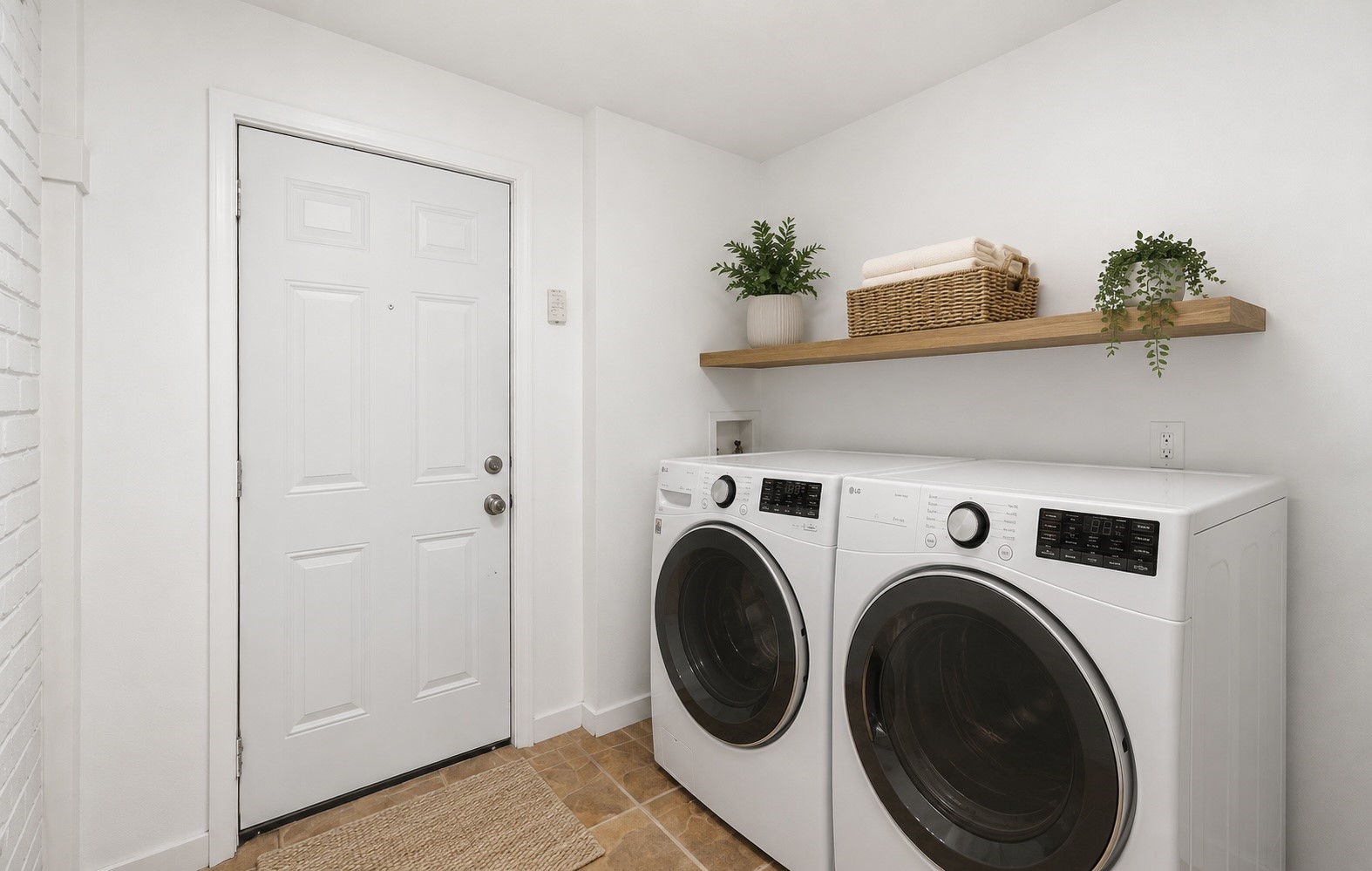 435 Rolling Wood Road Baytown, TX 77520 - Photo 27 of 31 a view of washer and dryer in a utility room
