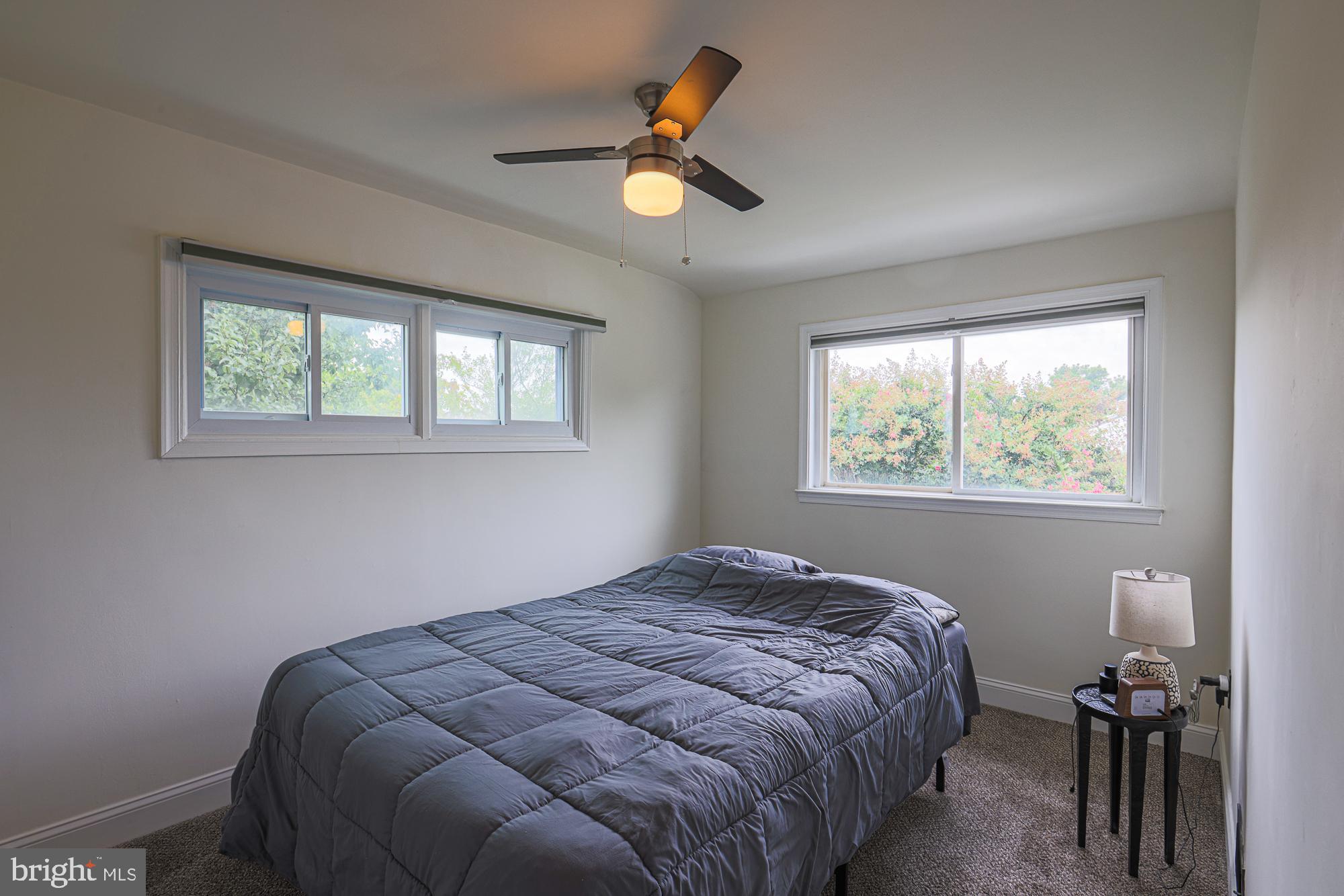 191 Alstun Road Essex, MD 21221 - Photo 31 of 40 a bedroom with a bed and a window