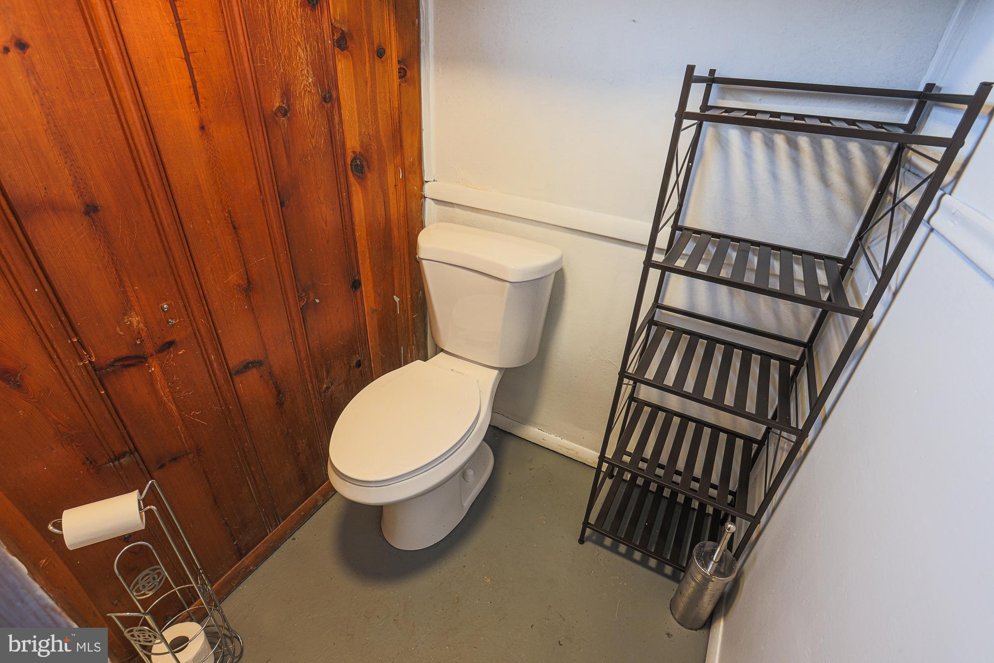 191 Alstun Road Essex, MD 21221 - Photo 36 of 40 a bathroom with a toilet and a shower
