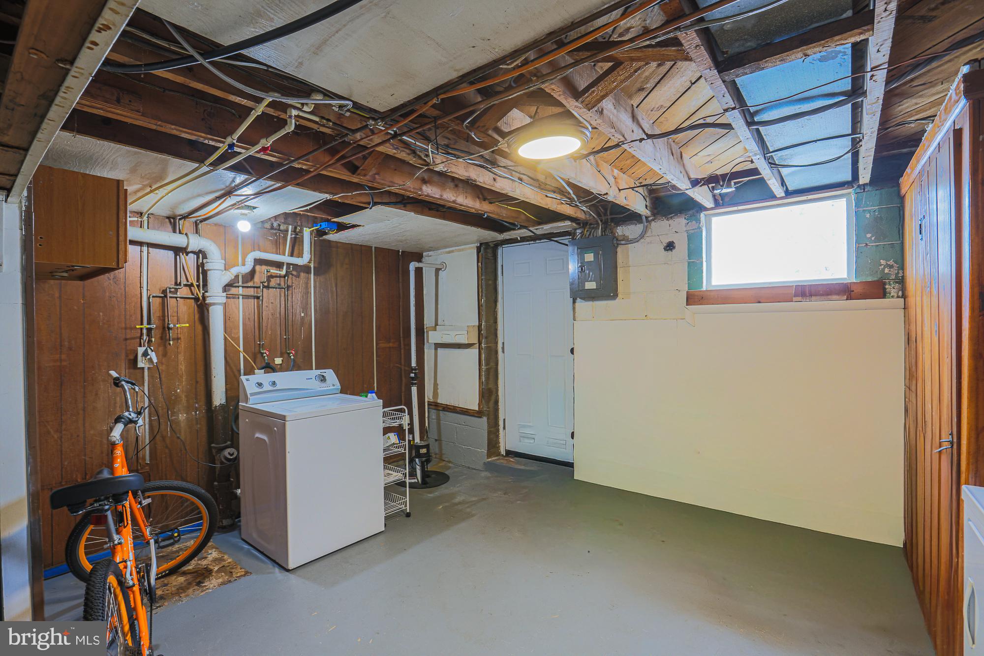 191 Alstun Road Essex, MD 21221 - Photo 39 of 40 a view of a storage & utility room with washer and dryer