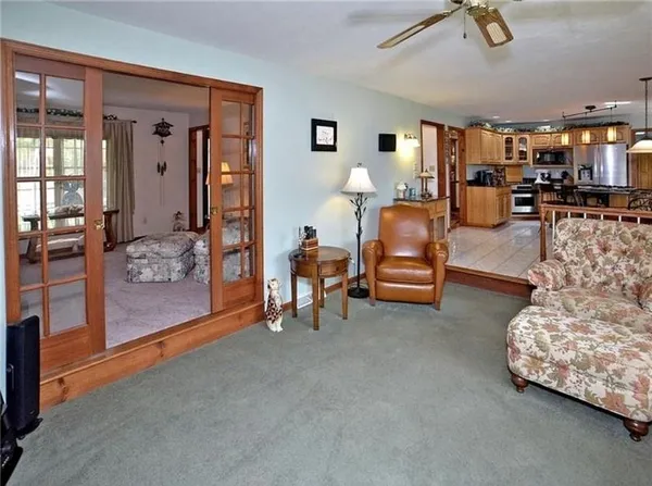 a living room with furniture and a area