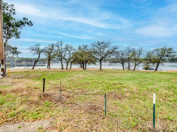 a view of open space with green field