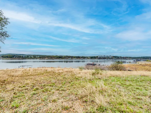 a view of a lake with a city