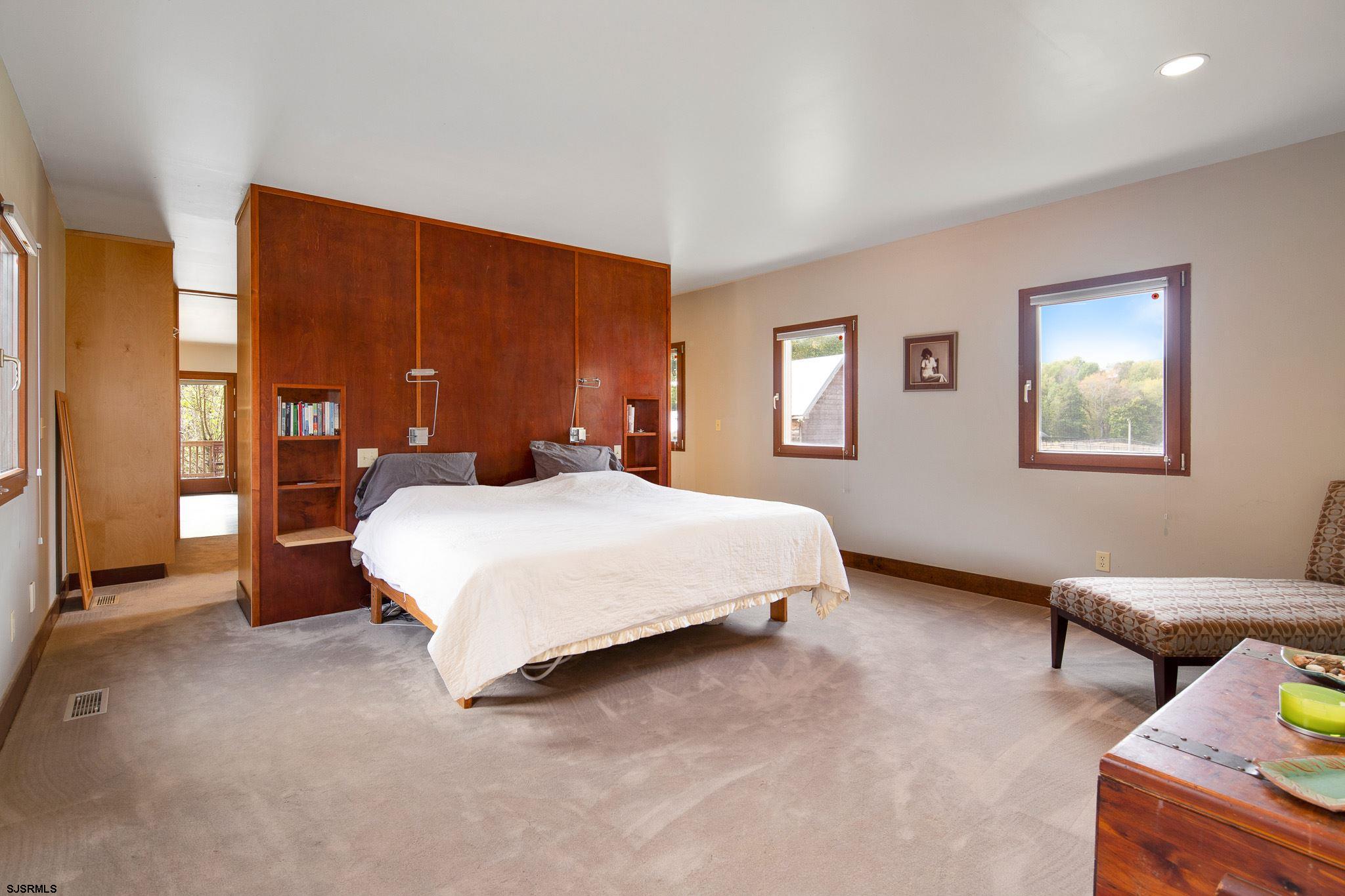 350 Mannington Yorktown Road Woodstown, NJ 08098 - Photo 17 of 23 a bedroom with a bed and wooden floor