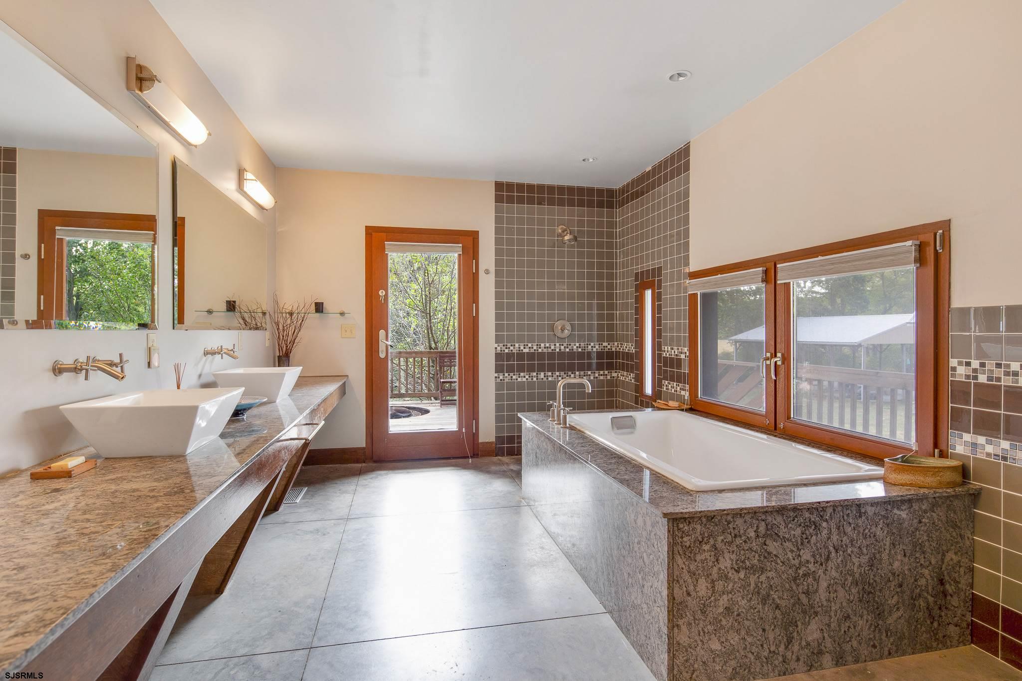 350 Mannington Yorktown Road Woodstown, NJ 08098 - Photo 19 of 23 a large spacious bathroom with a large tub and large window