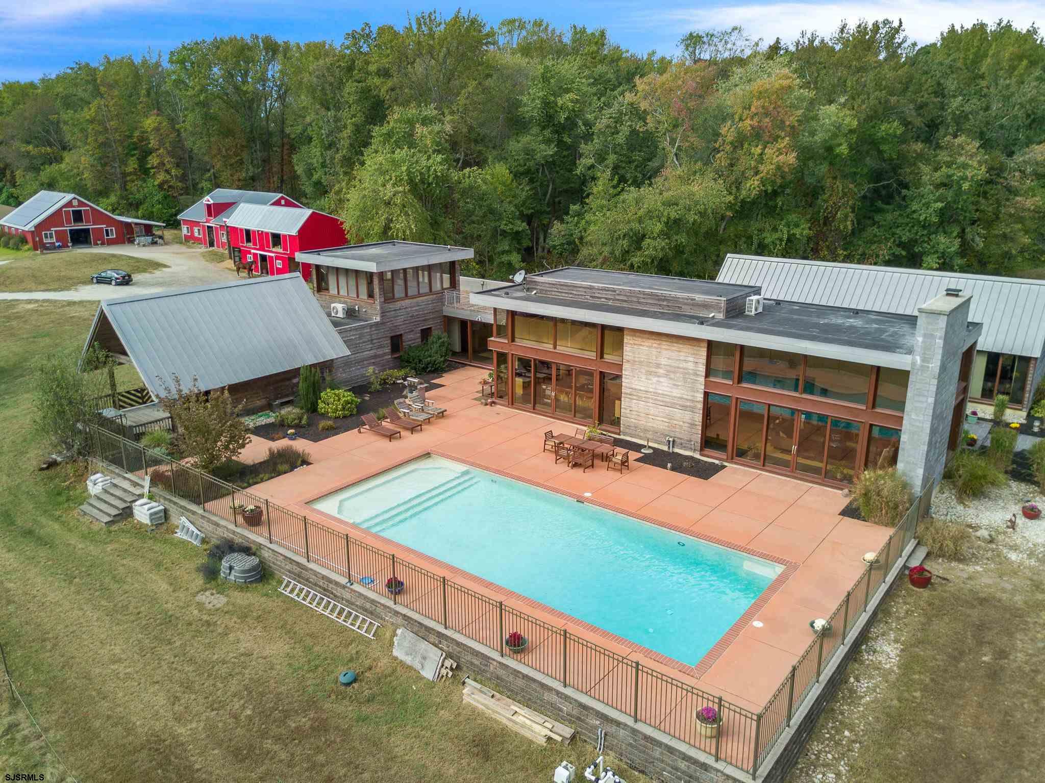 350 Mannington Yorktown Road Woodstown, NJ 08098 - Photo 6 of 23 an aerial view of a house with pool patio and outdoor seating