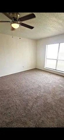 a view of a room with a window