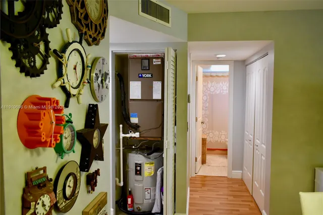 a view of living room with furniture and chandelier