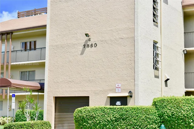 a view of car parked in front of building