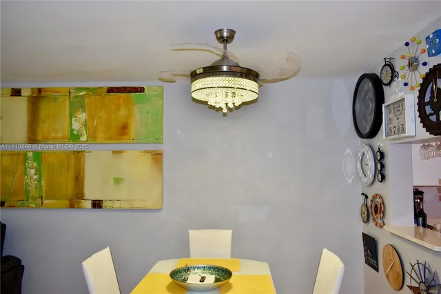 a bathroom with a sink mirror and vanity