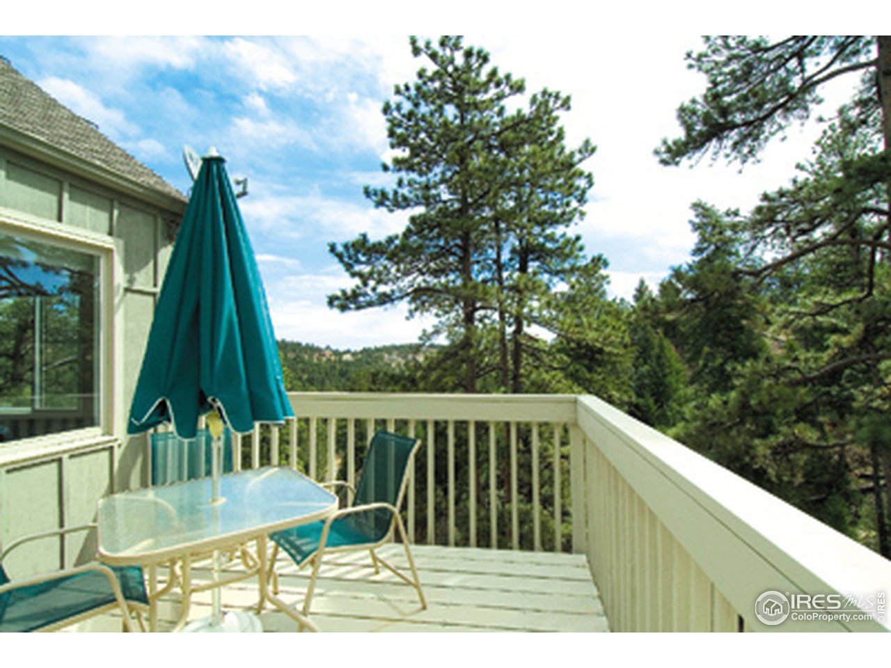 975 Kelly Road West Boulder, CO 80302 - Photo 1 of 8 a view from deck having patio