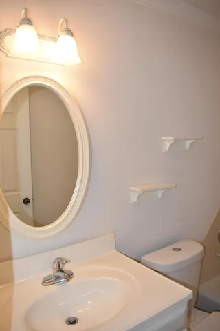 a bathroom with a bathtub and a sink