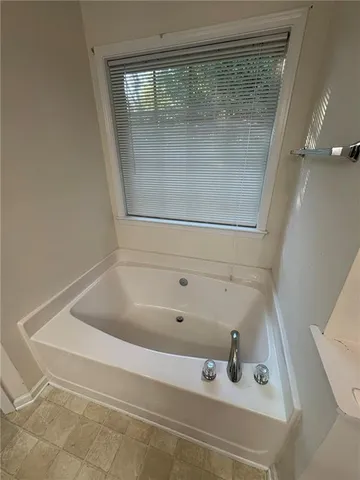 a bathroom with a bathtub