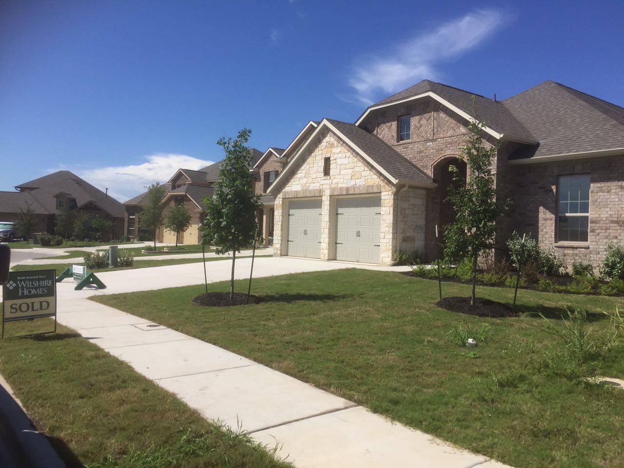 8337 Angelo Loop Round Rock, TX 78665 - Photo 2 of 22 a front view of a house with a yard