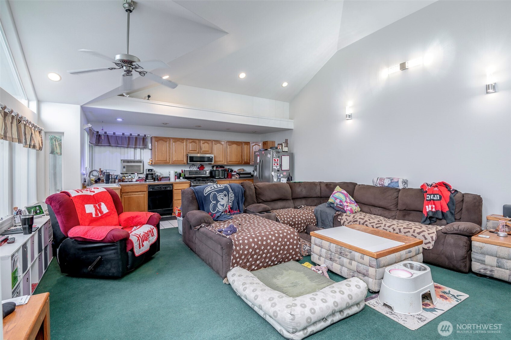 4048 Southeast Horstman Road Port Orchard, WA 98366 - Photo 18 of 40 a living room with furniture and a chandelier