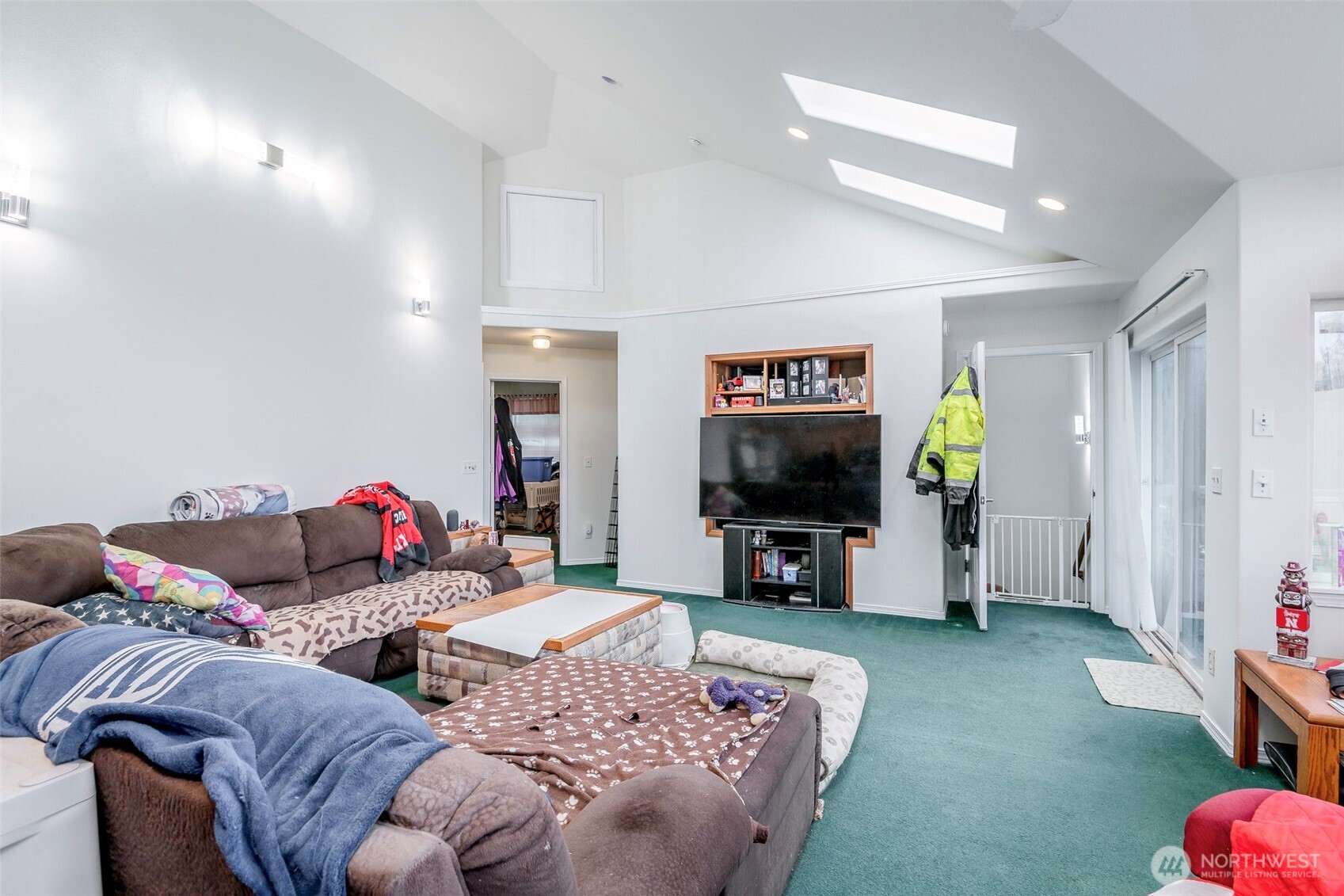 4048 Southeast Horstman Road Port Orchard, WA 98366 - Photo 19 of 40 a living room with furniture and a flat screen tv
