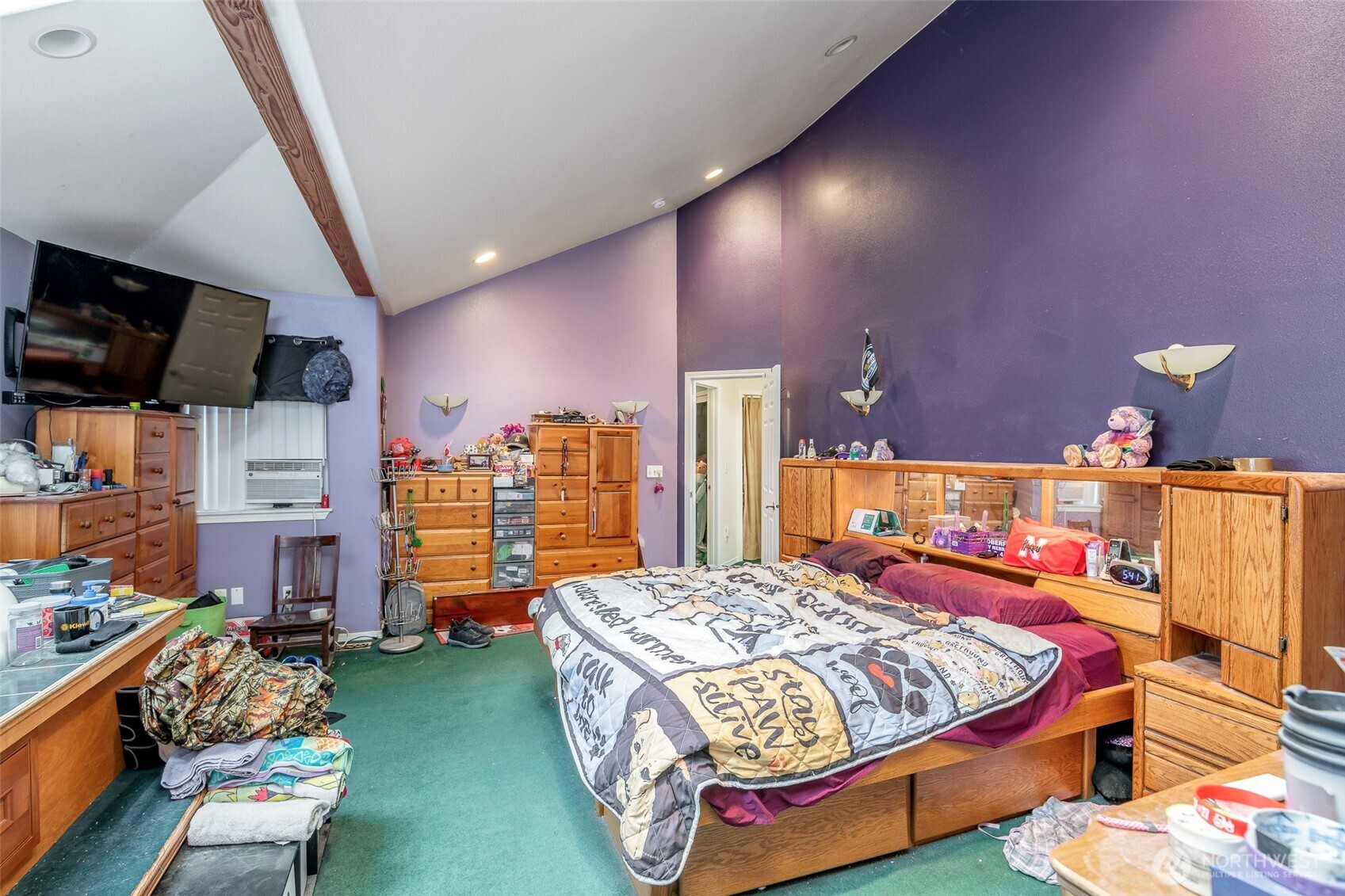 4048 Southeast Horstman Road Port Orchard, WA 98366 - Photo 26 of 40 a bedroom with a bed and wooden floor