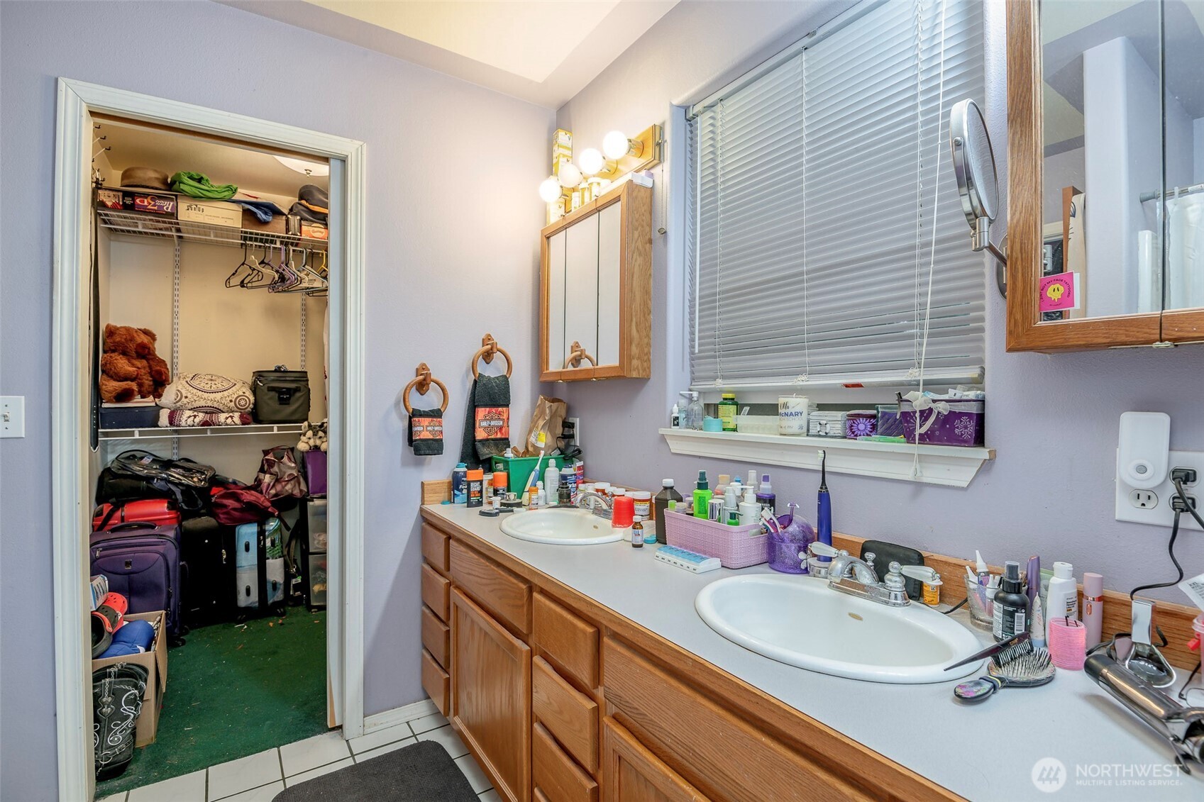 4048 Southeast Horstman Road Port Orchard, WA 98366 - Photo 28 of 40 a bathroom with a sink double vanity and a mirror