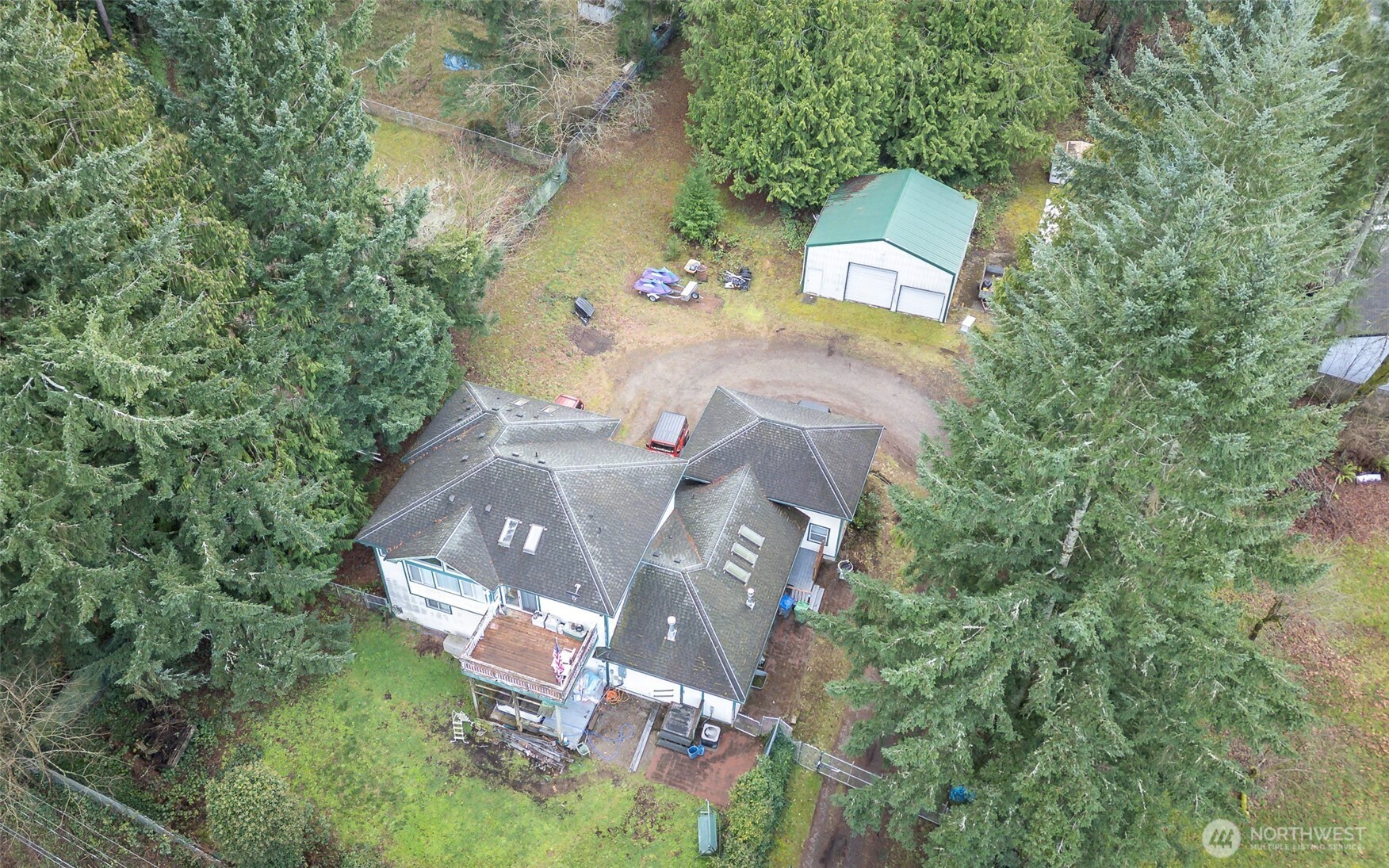4048 Southeast Horstman Road Port Orchard, WA 98366 - Photo 38 of 40 an aerial view of a house with outdoor space and trees all around