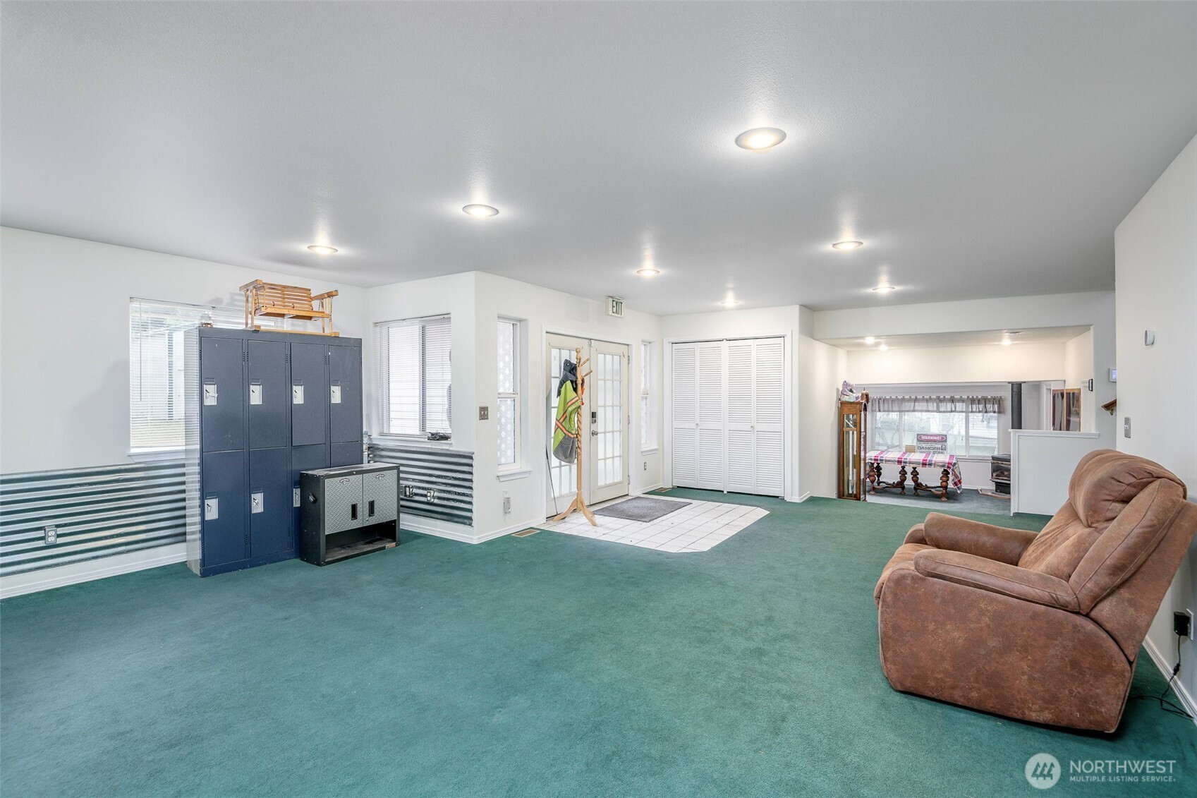 4048 Southeast Horstman Road Port Orchard, WA 98366 - Photo 6 of 40 a living room with furniture and a flat screen tv