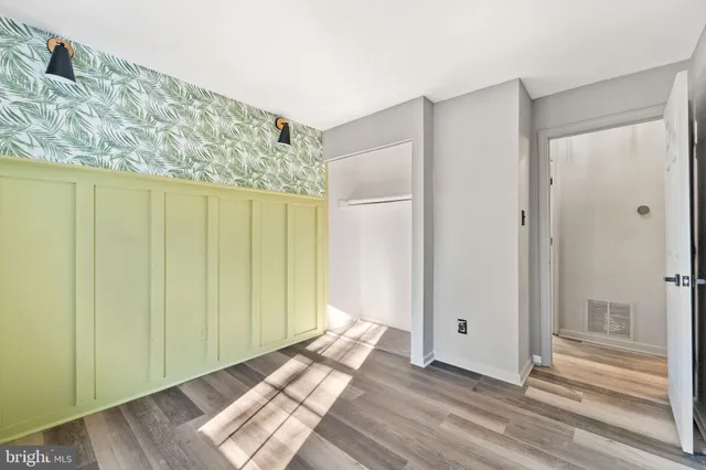 a view of entryway with wooden floor