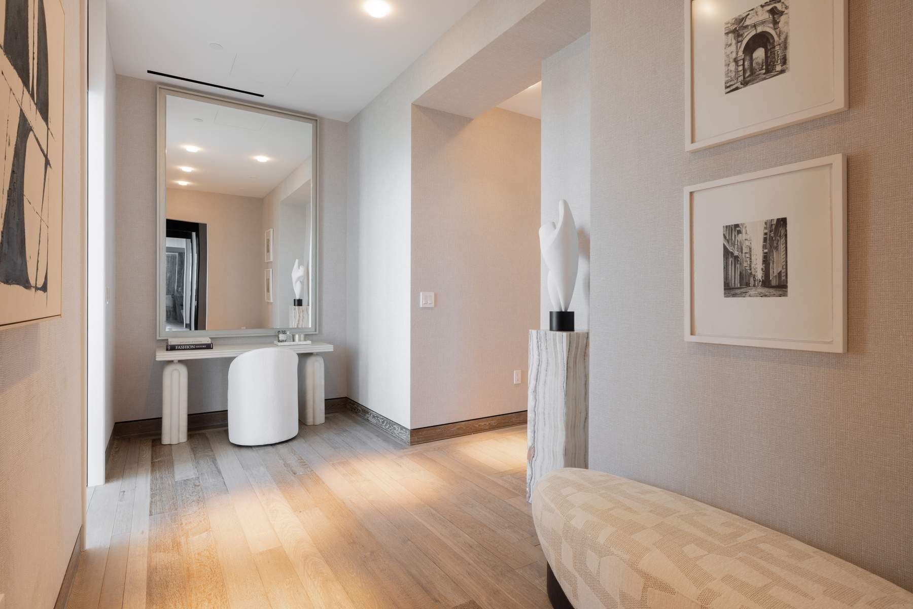 111 West 57th Street, Unit PH76 Manhattan, NY 10019 - Photo 14 of 40 a view of a bathroom with a bathtub and wooden floor