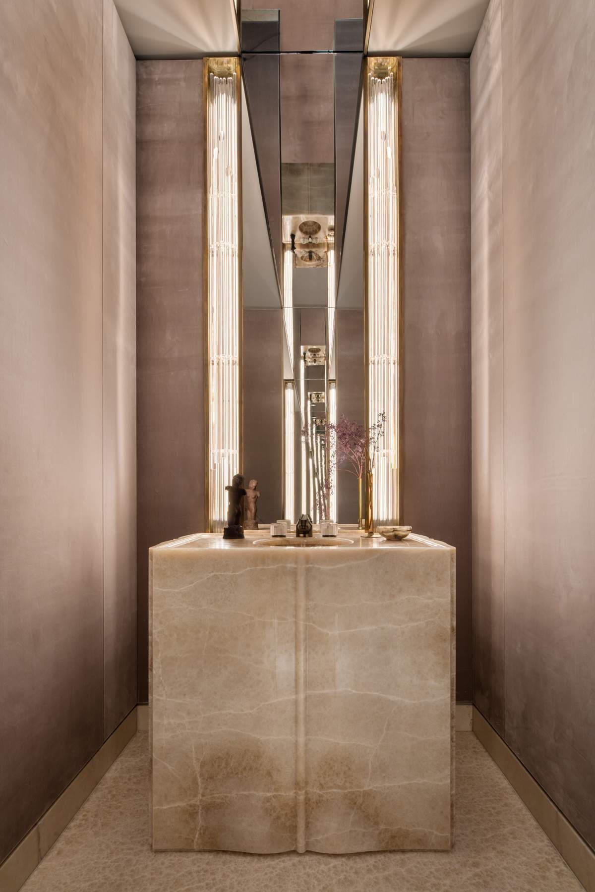 111 West 57th Street, Unit PH76 Manhattan, NY 10019 - Photo 17 of 40 a view of a bathroom with mirror and window