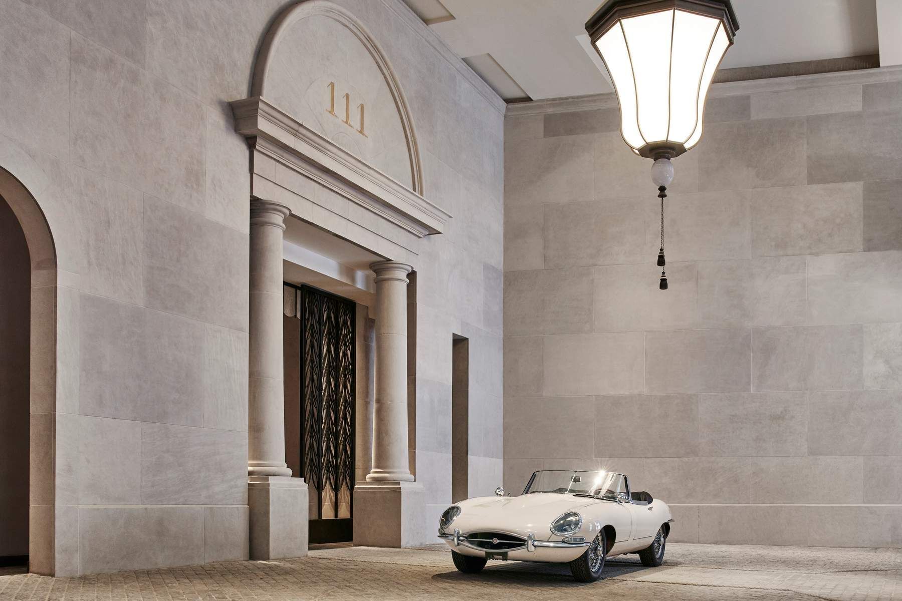 111 West 57th Street, Unit PH76 Manhattan, NY 10019 - Photo 22 of 40 a view of a livingroom with a car parked front door