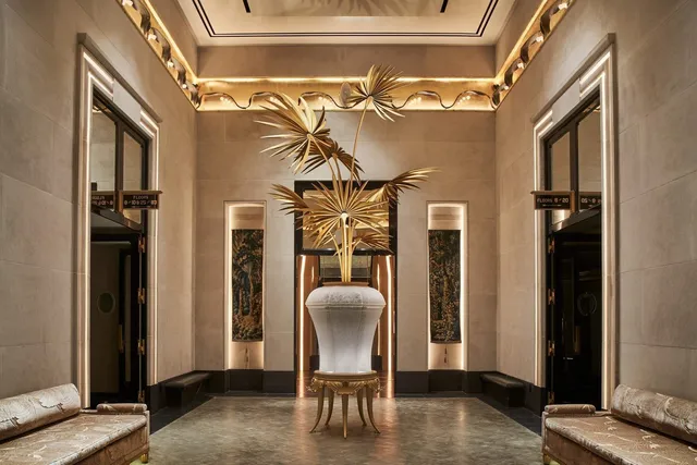 a room with wooden floor and furniture