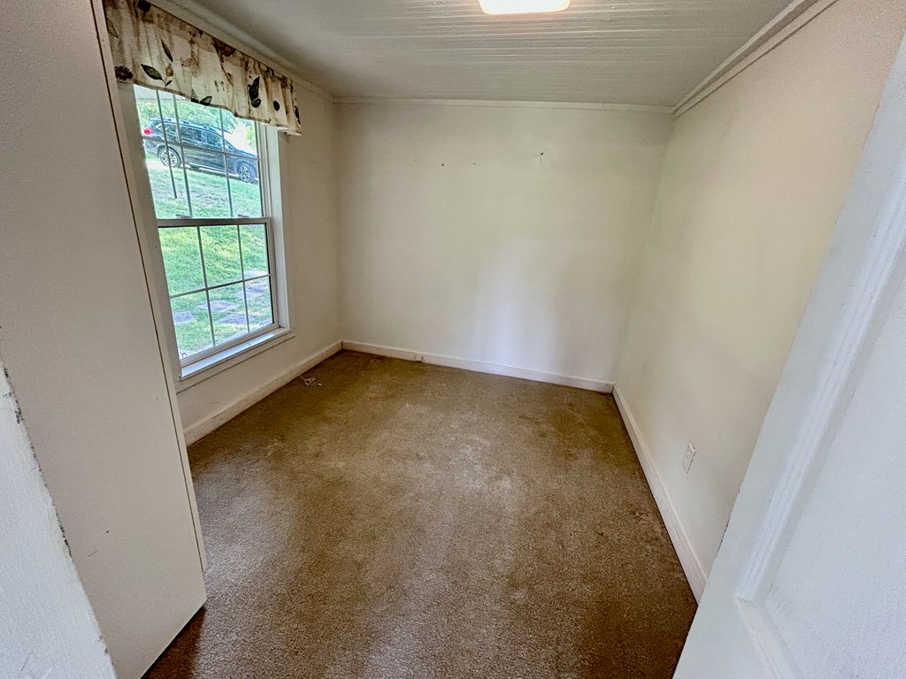 136 West Vineyard Road Hayesville, NC 28904 - Photo 7 of 17 an empty room with a window