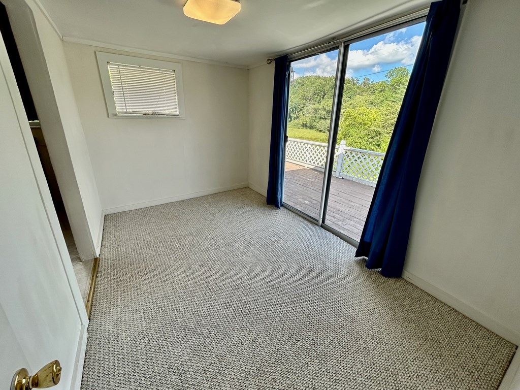 136 West Vineyard Road Hayesville, NC 28904 - Photo 9 of 17 an empty room with windows and closet