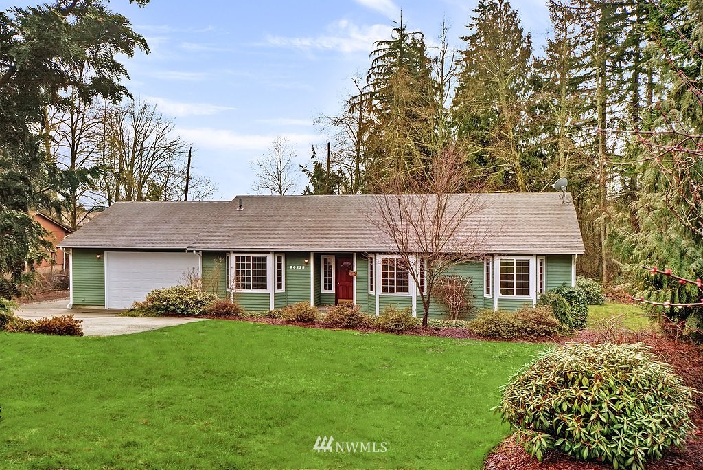 20223 Southeast 152nd Street Renton, WA 98059 - Photo 1 of 18 a aerial view of a house with a yard and potted plants