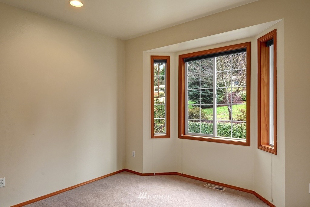 20223 Southeast 152nd Street Renton, WA 98059 - Photo 11 of 18 a view of an empty room with a window