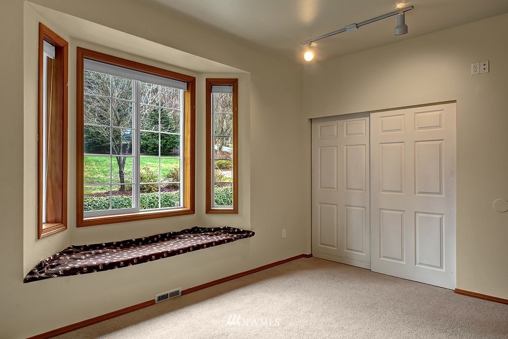 20223 Southeast 152nd Street Renton, WA 98059 - Photo 12 of 18 a view of an empty room with a window
