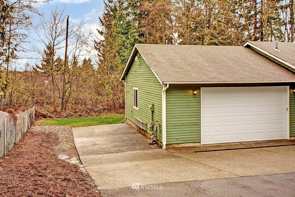 20223 Southeast 152nd Street Renton, WA 98059 - Photo 3 of 18 a view of backyard of house