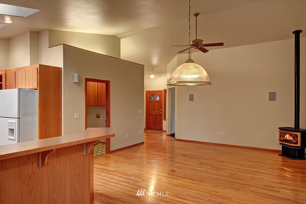 20223 Southeast 152nd Street Renton, WA 98059 - Photo 5 of 18 a view of a livingroom with wooden floor