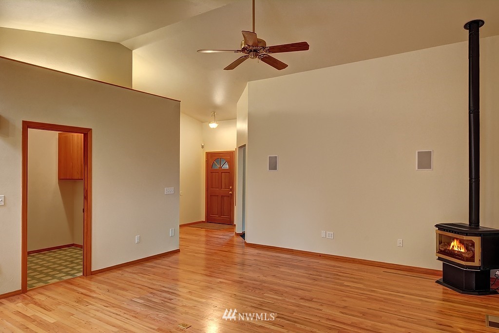 20223 Southeast 152nd Street Renton, WA 98059 - Photo 9 of 18 a view of empty room with wooden floor