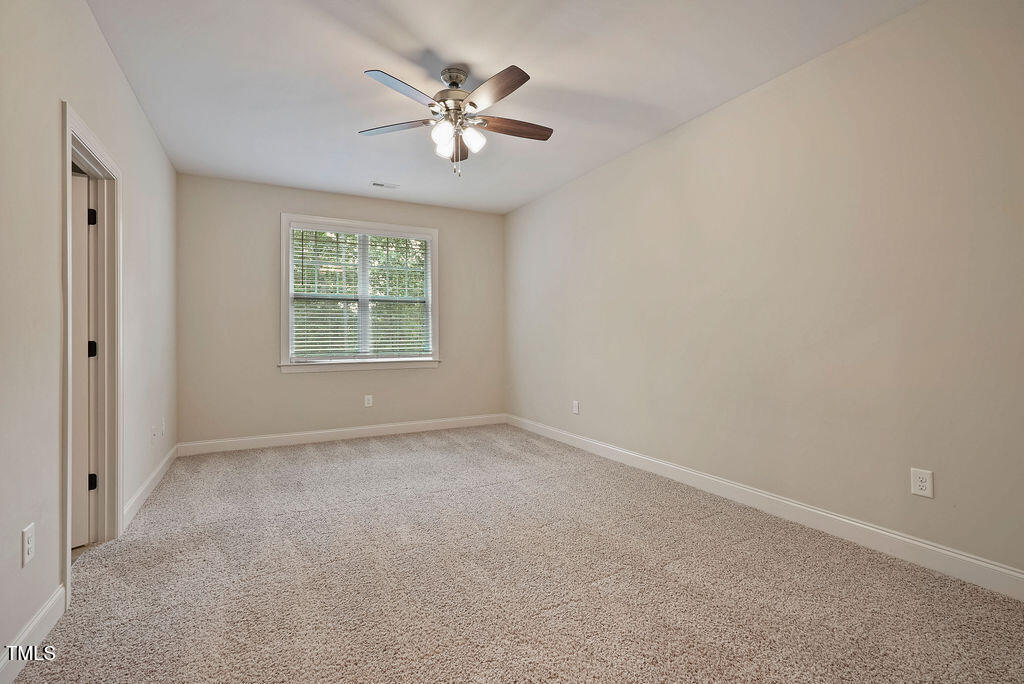 1124 Armsleigh Court Raleigh, NC 27603 - Photo 28 of 33 an empty room with a window