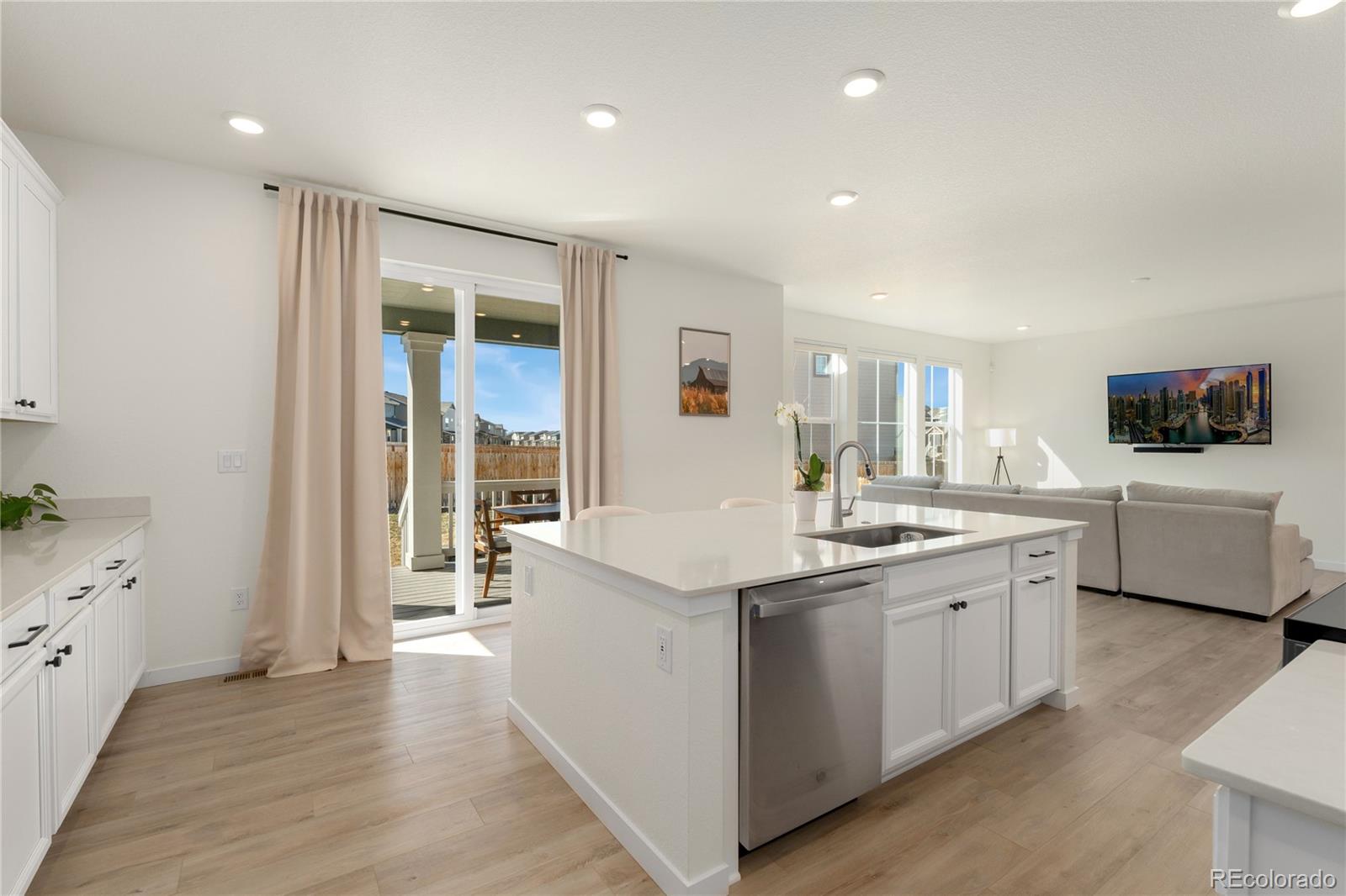 817 S Flat Aurora, CO 80018 - Photo 18 of 41 a kitchen with sink and cabinets
