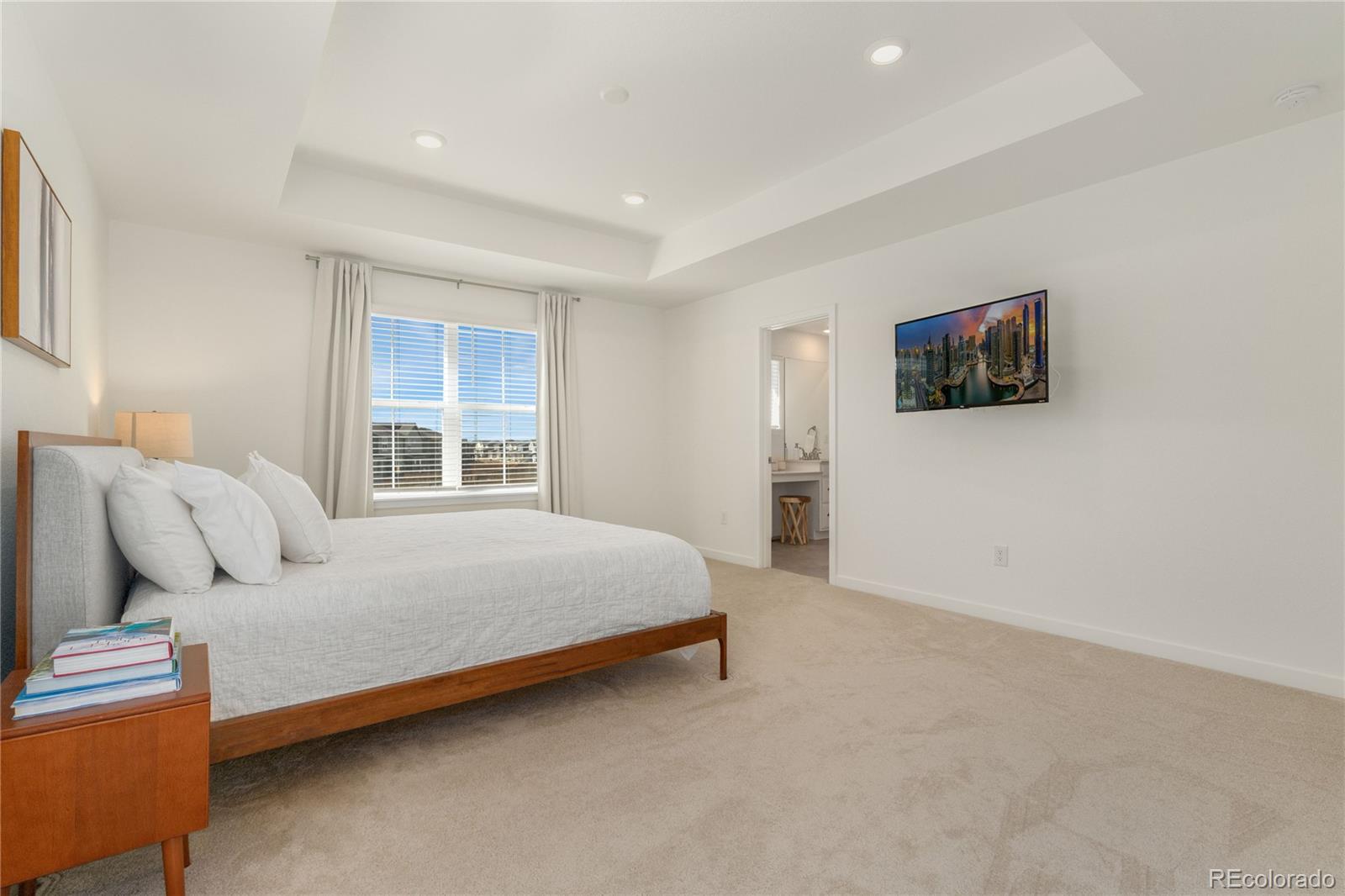 817 S Flat Aurora, CO 80018 - Photo 27 of 41 a bedroom with bed and window