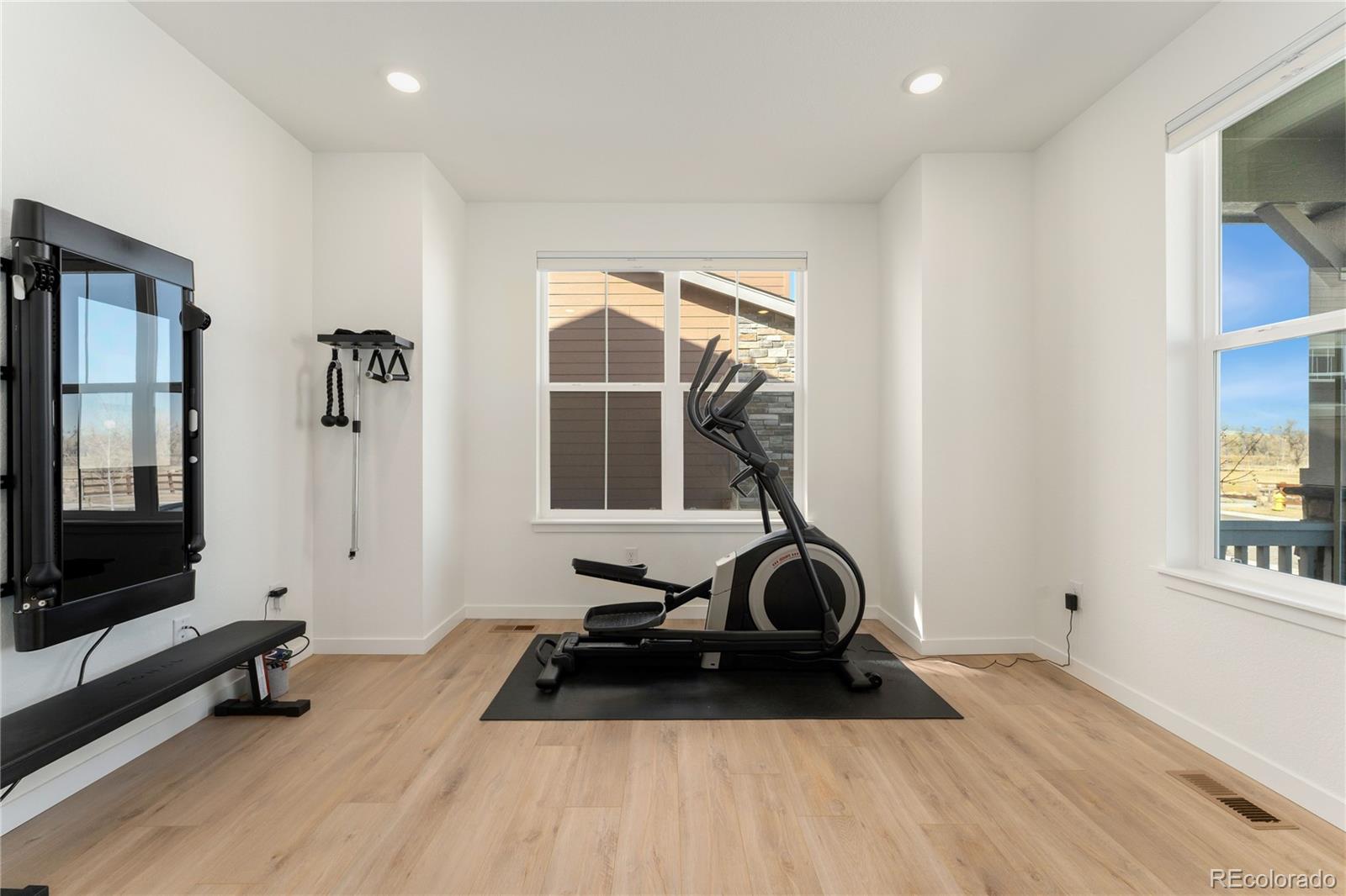 817 S Flat Aurora, CO 80018 - Photo 5 of 41 a view of a room with gym equipment