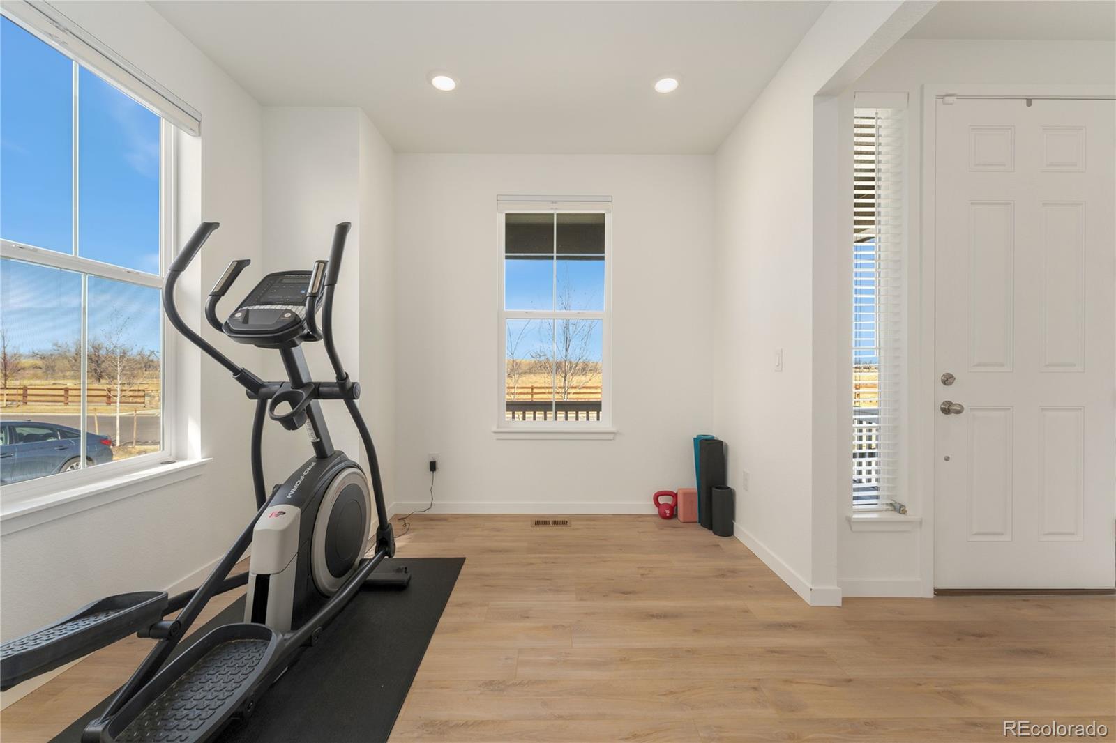 817 S Flat Aurora, CO 80018 - Photo 6 of 41 a view of a room with gym equipment