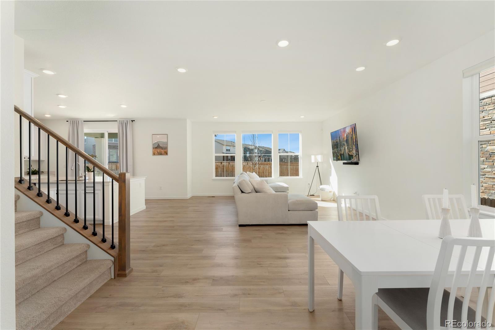 817 S Flat Aurora, CO 80018 - Photo 10 of 41 a living room with furniture and a flat screen tv