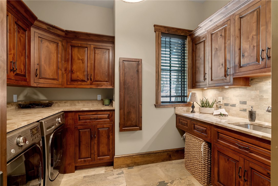 104 Crooked Stick Court Sunset, SC 29685 - Photo 16 of 43 This spacious laundry room offers ample storage and a functional layout for daily tasks.